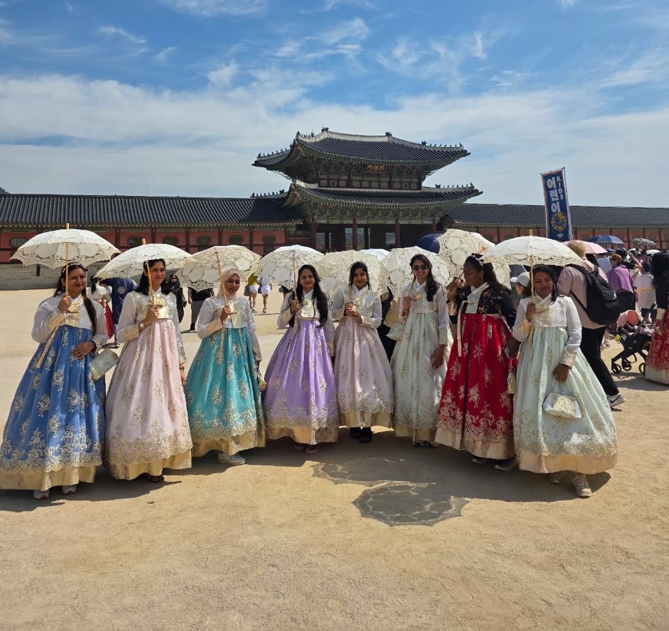 Rush Holidays group in hanbok at Gyeongbokgung Palace